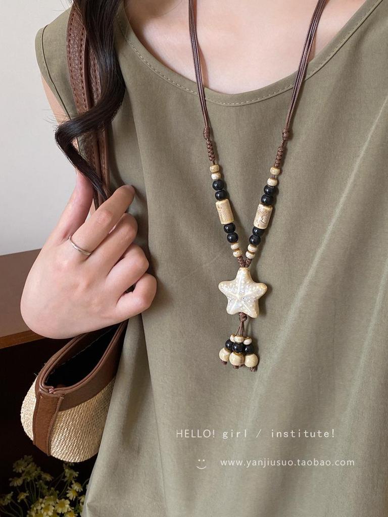 Retro Chinese Tassel Necklace: Unique Ethnic Style Women's High-End Clavicle Chain.