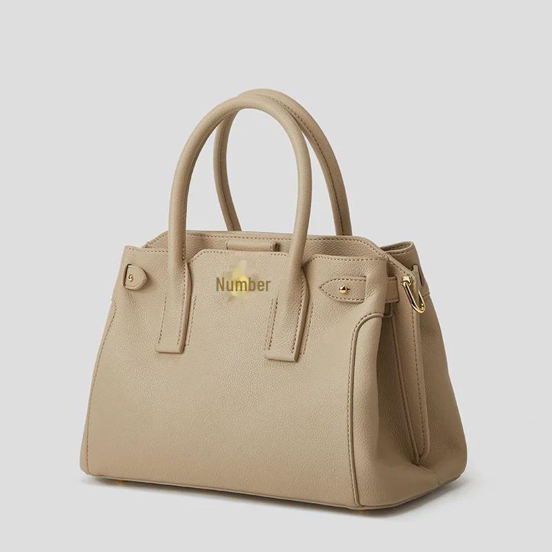 Chic Women's Tote Bag: Niche Design, Hand-Held Platinum, Large-Capacity, Fashionable Messenger Bag.