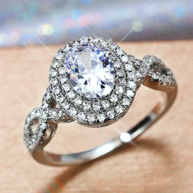 

Новые необычные женские обручальные кольца овальной огранки с цирконием, дизайнерское кольцо с кристаллами, изящные свадебные аксессуары, модные ювелирные изделия 8