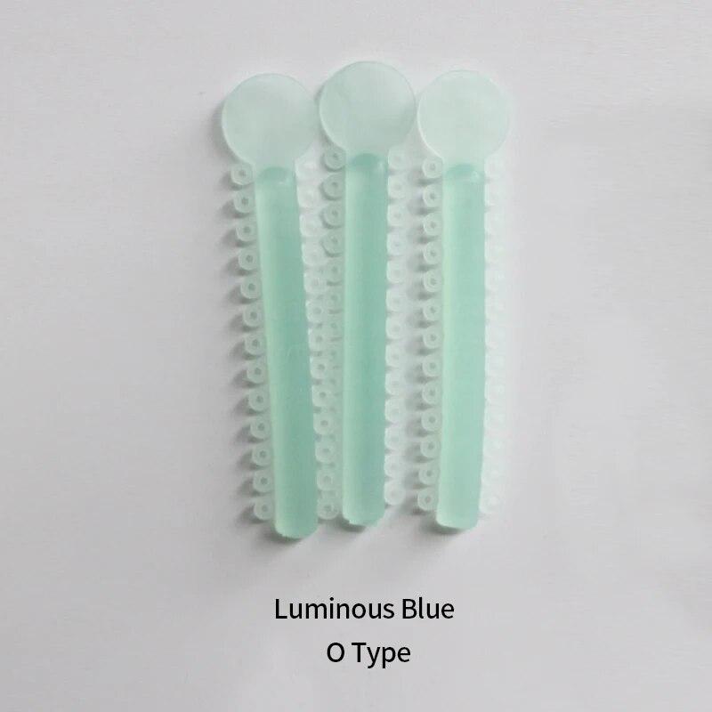 

Ортодонтическая эластичная светящаяся лигатура Night-Light для ортодонтических брекетов OType Blue