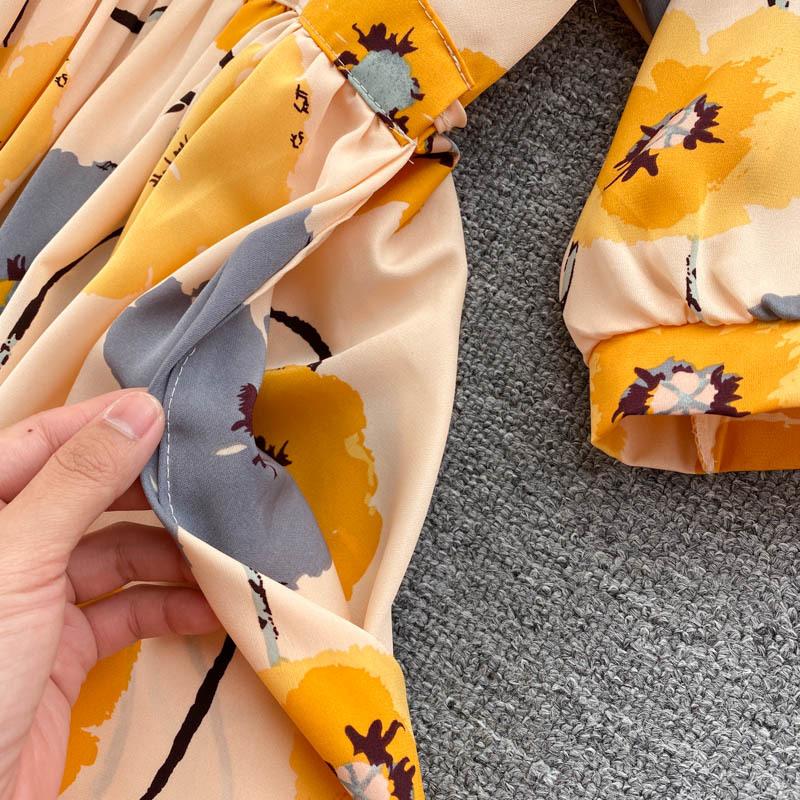 Abito estivo da donna stampato vintage elegante scollo a V manica a sbuffo vita alta abito midi a trapezio abiti da spiaggia per le vacanze femminili