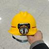 Capacete de segurança antiestático com lanterna integrada para mineração e pesca noturna.