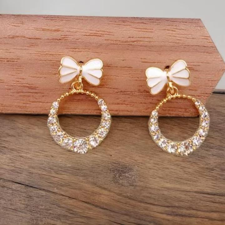 Elegant Rhinestone Bow Earrings for Women - Hollow, Round Design