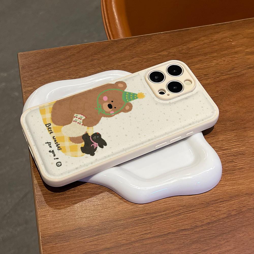 Applicable to iPhone17PRO birthday bear mobile phone case black cat illustration Apple 16/15 anti-drop leather pattern bread case