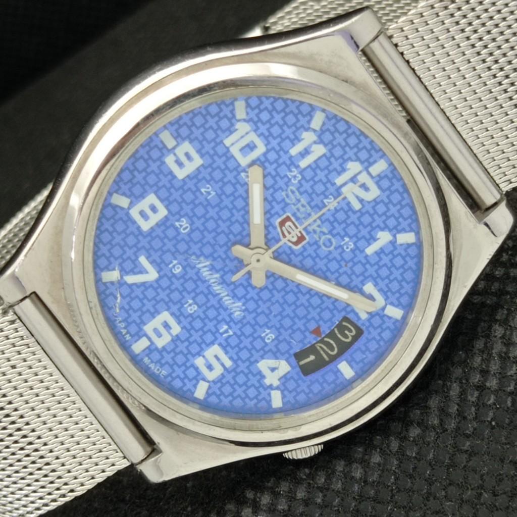 

Б/У винтажные мужские часы SEIKO 5 AUTOMATIC 7009A JAPAN MENS DATE BLUE WATCH 595a-a312325-2 SKU595a-a312325