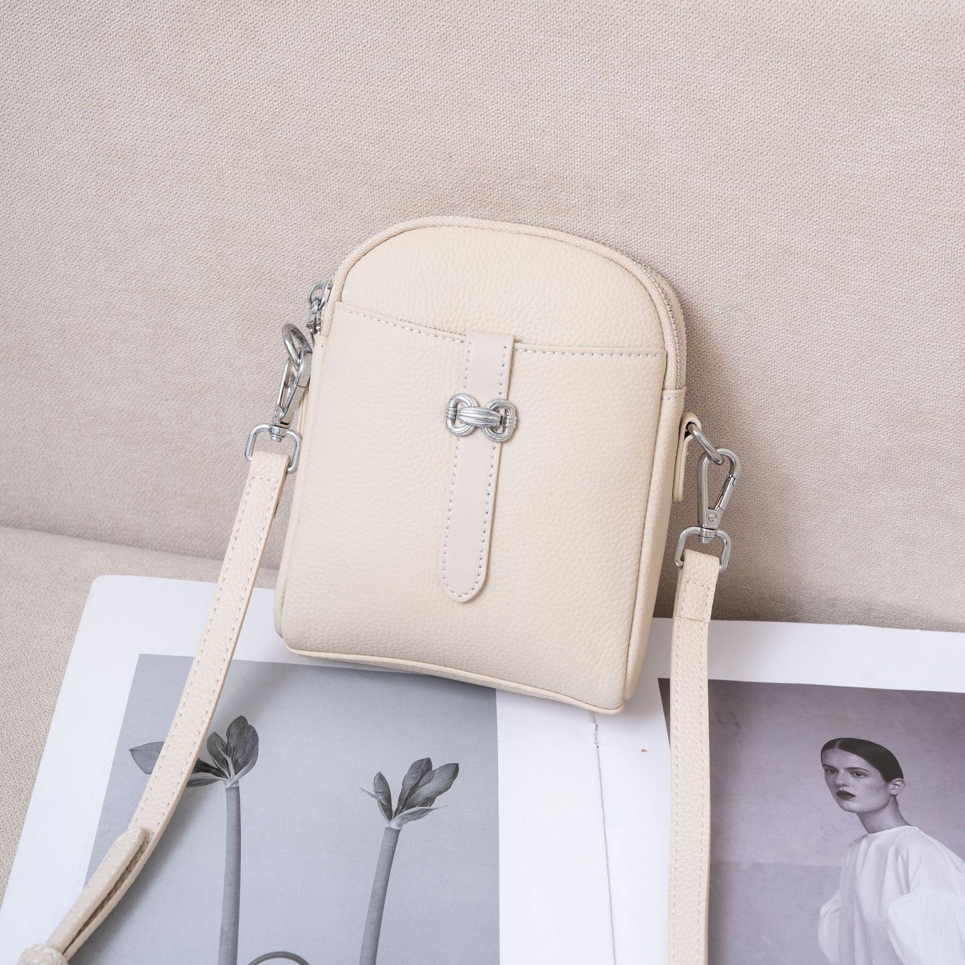 

Togo First-Layer Cowhide Niche Light Luxury Bag Women S Bag Hand Grab Handbag Simple Women S Mobile Phone Change Shell Bag грязно-белый