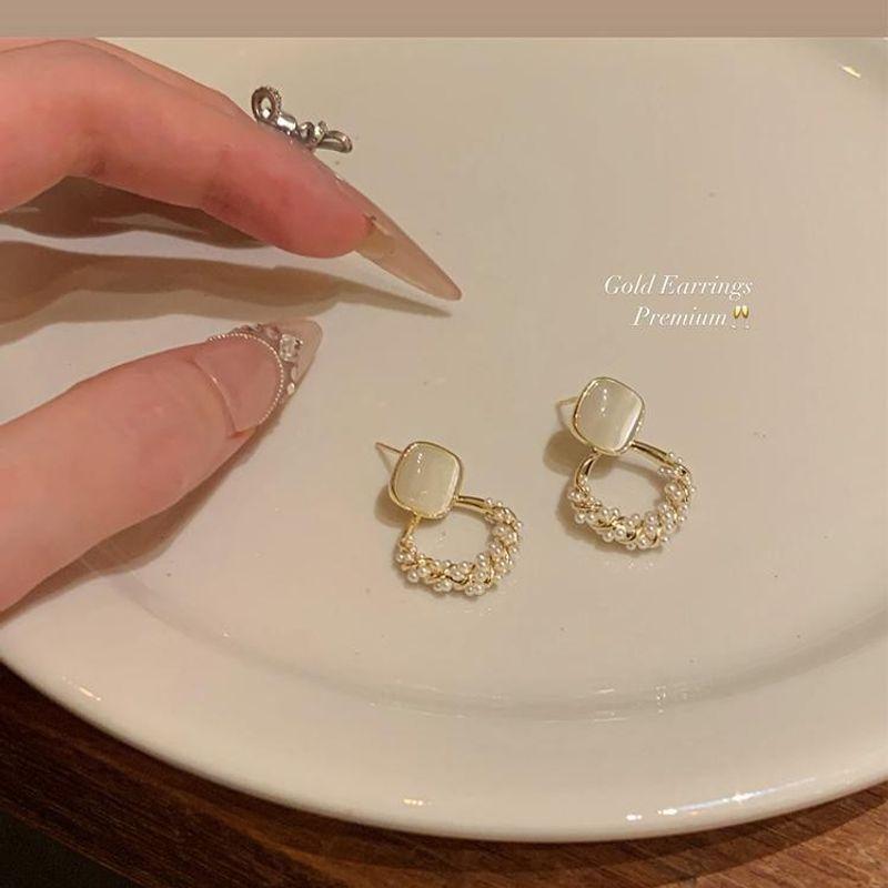 

Доступная Роскошь Кубический Сахар Жемчуг Элегантные Женские Серьги Опал S925 silver needle-cat eye pearl earrings a pair