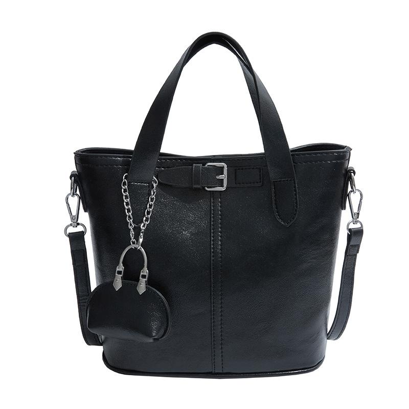 

Winter new simple casual hand bucket bag shoulder messenger bag niche high sense чёрный
