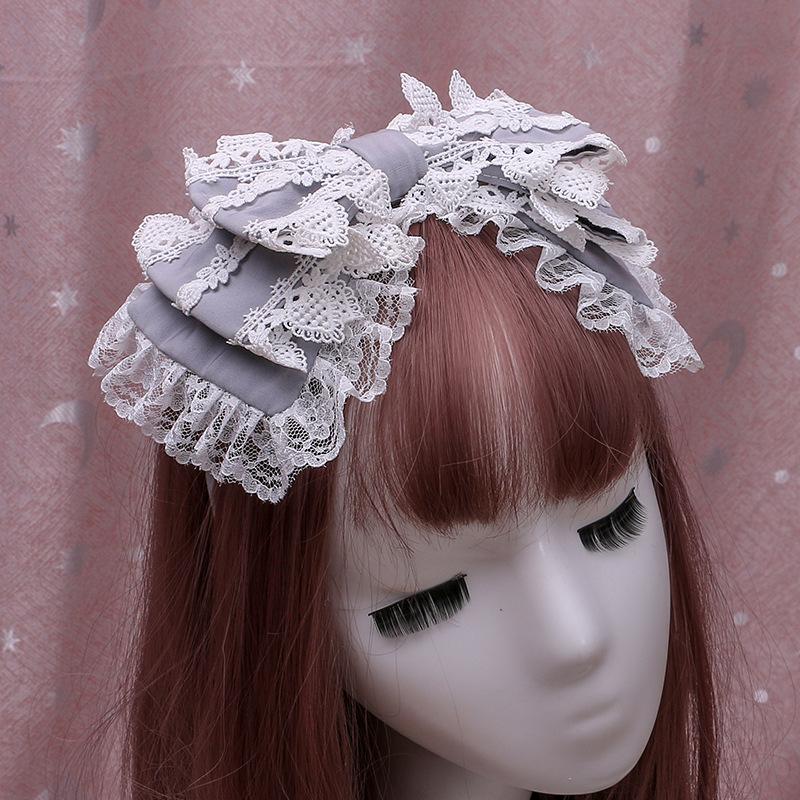 

A handmade Japanese Lolita hairpin soft sister headgear Lolita lace bow headband wrapped