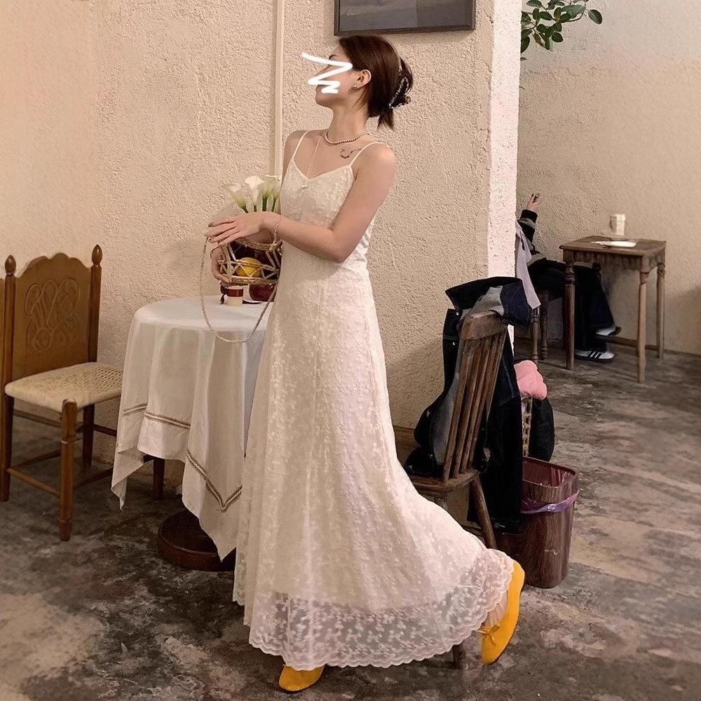 Super good-looking, unique and beautiful skirt French embroidery lace suspender dress women's summer temperament seaside vacation dress