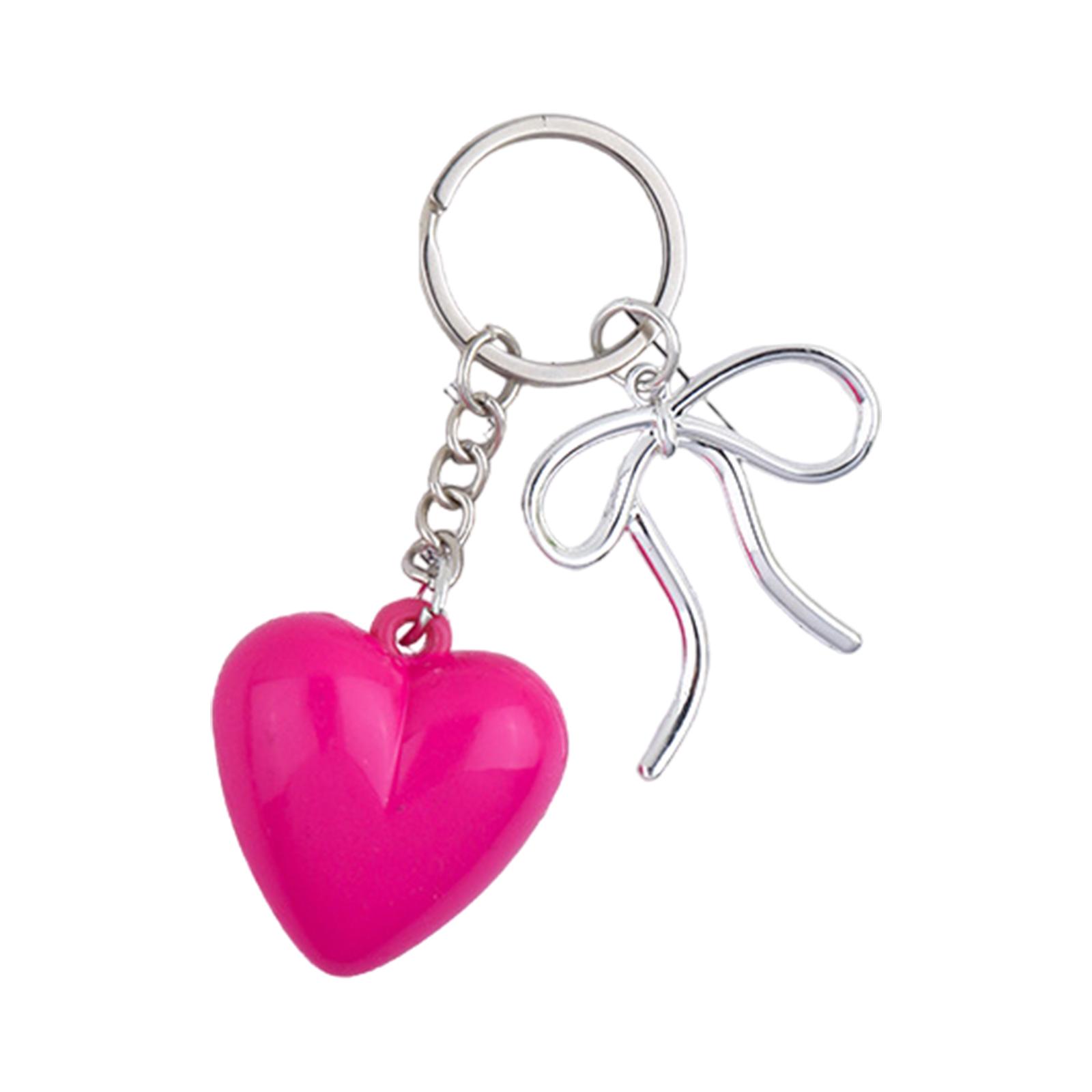 Элегантный брелок в форме сердца с бантом — фото 11
