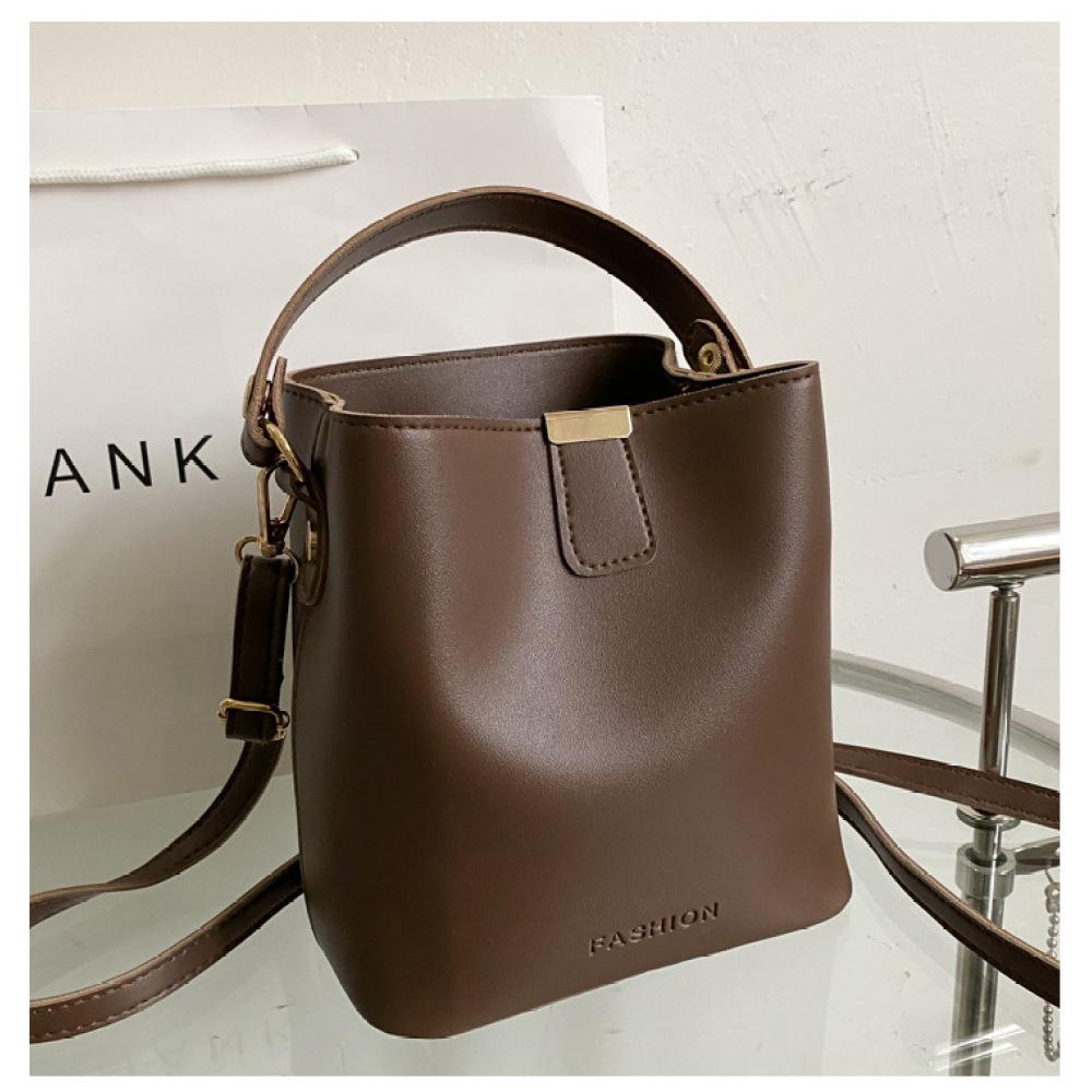 

Модная и свежая женская популярная ручная сумка-ведро через плечо темно-коричневого