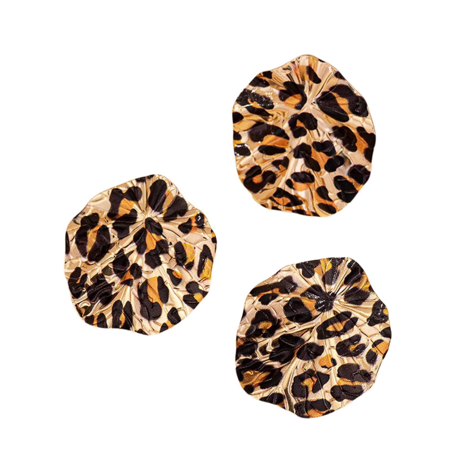 

Винтажный комплект из серег и колец из сплава с леопардовым принтом. Модный аксессуар для модных женщин, ищущих уникальные стили.