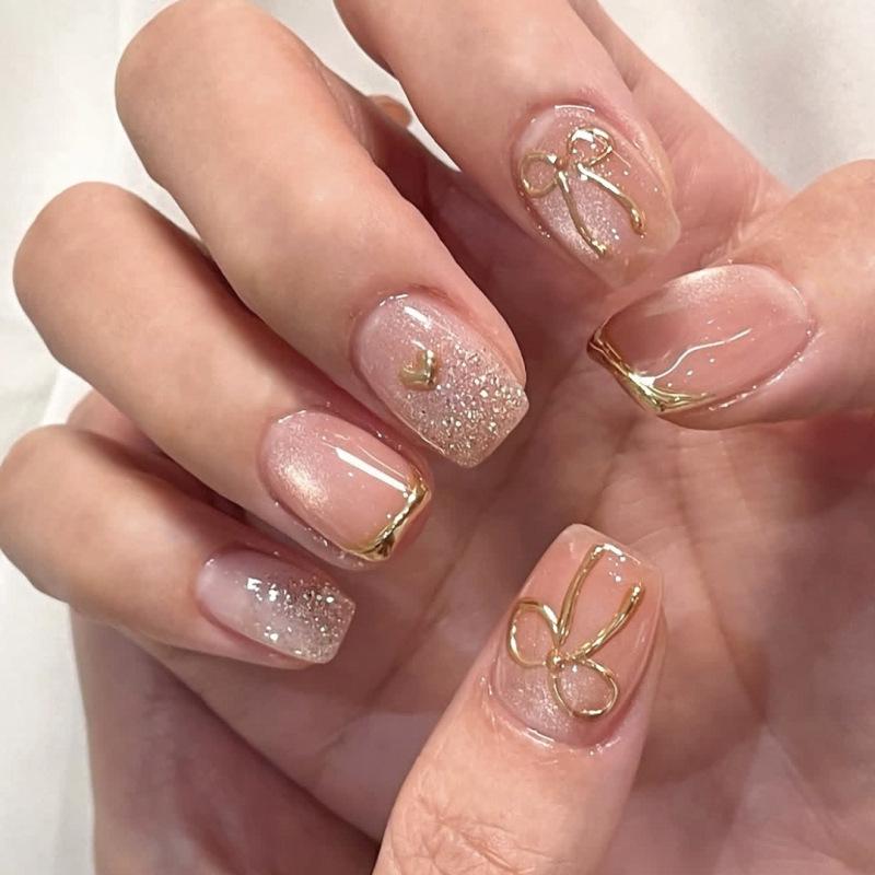 Short Cat Eye Sparkle Press-on Nails with 3D Gold Bow Tips