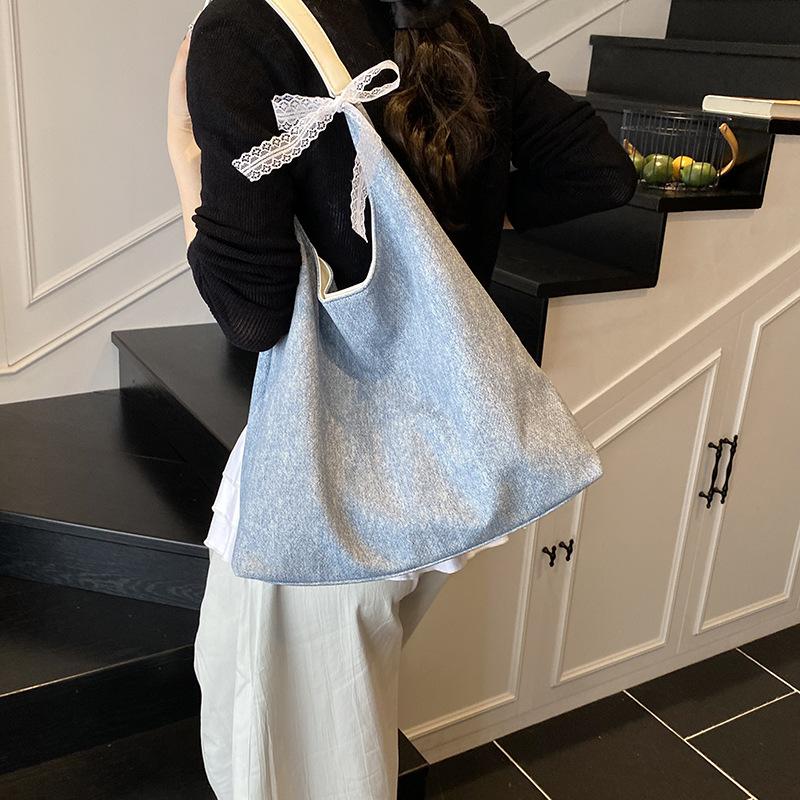 

Casual high-end bag women s 2025 new college style tote bag versatile large-capacity shoulder armpit bag синій