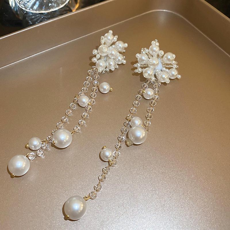 Silver Needle White Heart Tassel Earrings: Luxurious, Versatile, and Stylish Stud Earrings for Women.