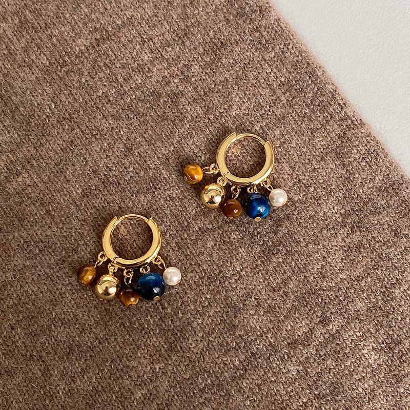 Zirkon Perlmutt Sunburst Ohrklemmen: Elegante, vielseitige Ohrringe für Frauen.