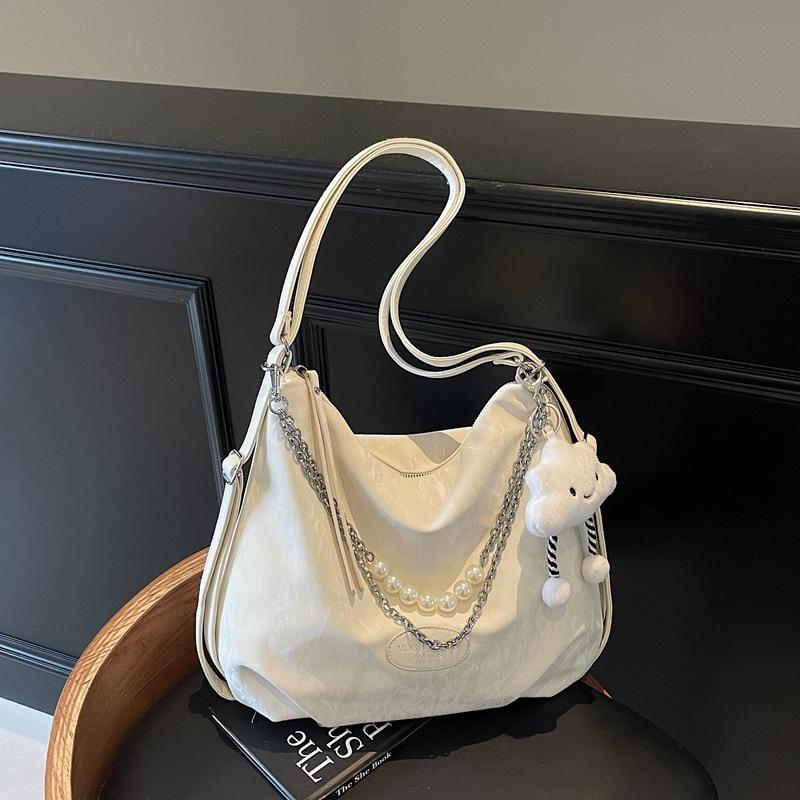 Urban simple large-capacity bag female summer new college students class shoulder women's bag high value messenger bag