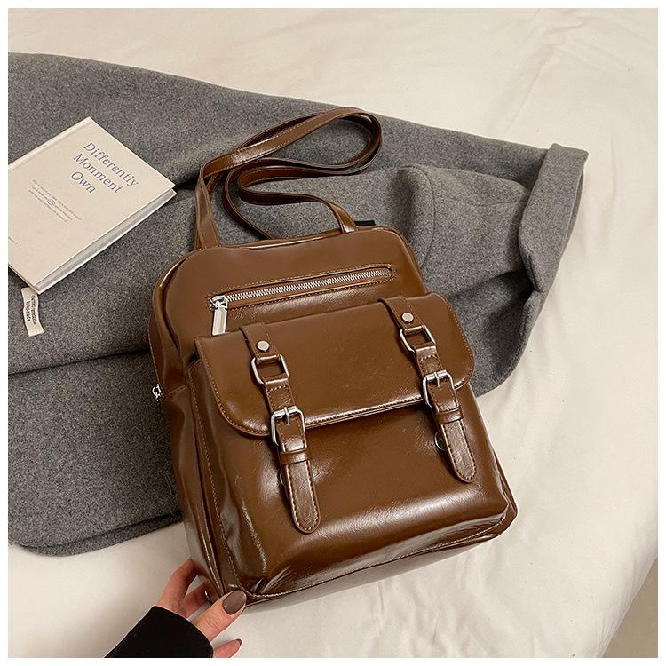 

2025 лето новый ретро ПУ рюкзак модный личность большая вместимость школьная сумка женская тренд однотонный деловой рюкзак коричневый