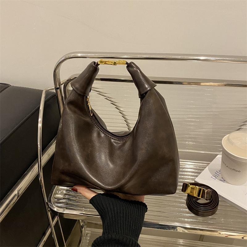 

Fashion retro bag women s autumn and winter new casual versatile commuter to work simple dumpling bag niche messenger bag