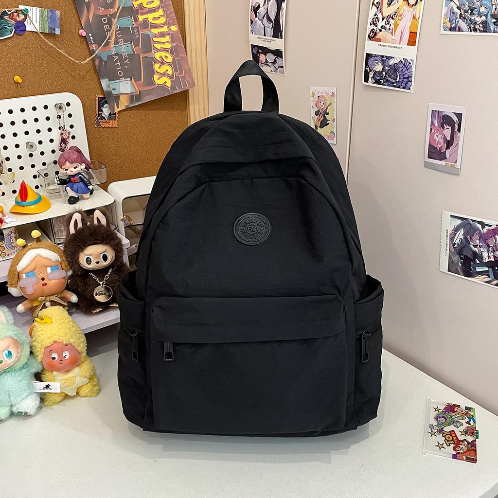 Mountaineering trip new Korean version schoolbag student backpack high school student junior high school student solid color simple backpack