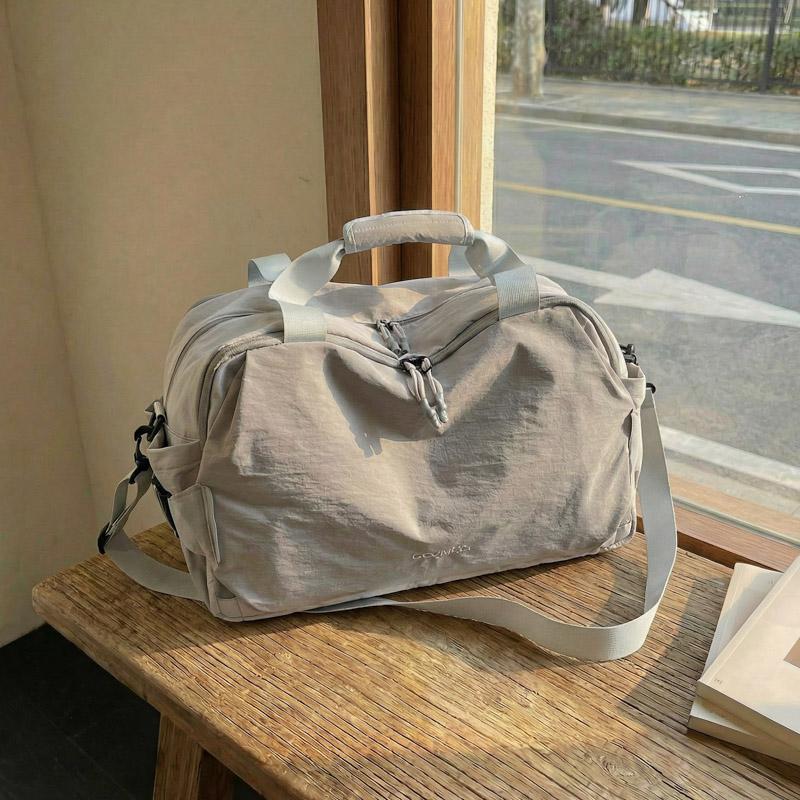 Compact Travel Duffel Bag with Adjustable Shoulder Strap Multiple Pockets Lightweight Weekender Bag