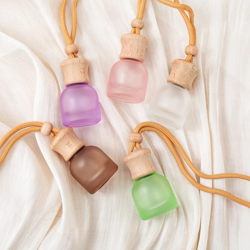 1 Stück nachfüllbare Auto ätherisches Öl Diffusor Flasche 11 ml Leerer Auto Lufterfrischer Anhänger Parfüm Glasflasche mit Holzkappen
