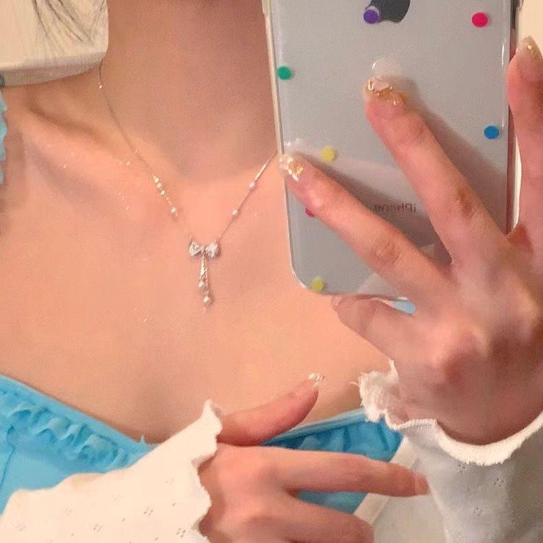 2024 High-End Pearl Bow Tassel Necklace - Elegant Luxury Clavicle Chain for Women