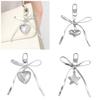 Heart Embellished Silver Leather Bowknot Key Rings Unique Accessory for Backpacks and Purses for the Modern Woman