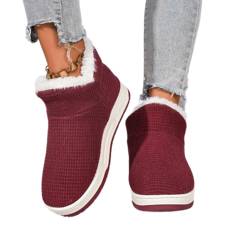 Non-slip thick-soled winter warm cotton slippers are all-inclusive, and men's and women's indoor soft-soled piled and thickened fluffy cotton shoes.