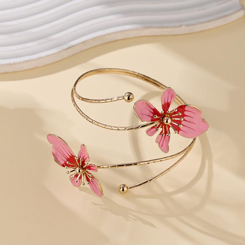Stylish and sexy floral open-face bracelet perfect for everyday wear holidays and parties; adjustable bracelet