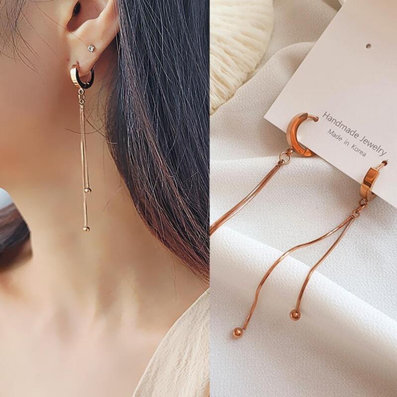 A minimalist, clean-cut, snake-like long earrings for women