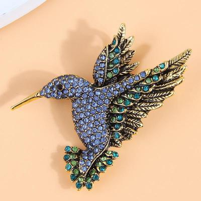 Elegante Vintage Kolibri Brosche: Funkelnde Damenbrosche mit Diamantakzent