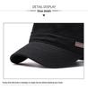 Men's Four-Season Breathable Flat Cap with Metal Logo - Outdoor Fashion Casual Sun Hat.