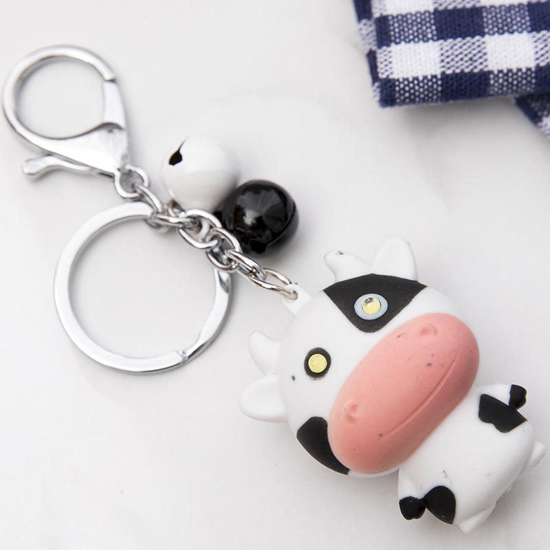 Luminous Cow Pendant Keychain: Sound & Light Accessory for Phones, Backpacks, and Luggage