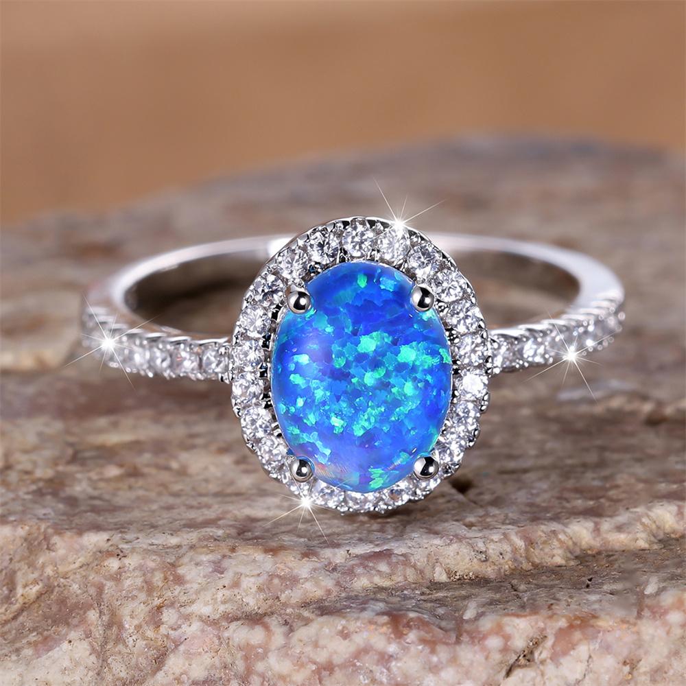 Classic Four Claw Oval Stone Ring Blue Fire Opal Engagement Band Trendy Silver Color Wedding Rings For Women Bridal Jewelry Gift