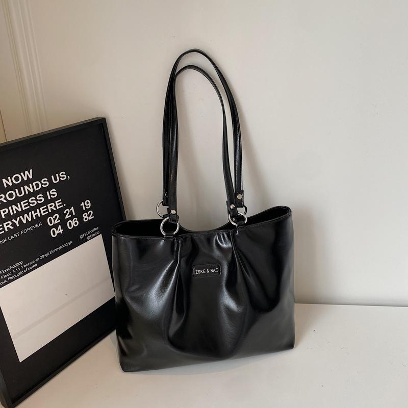 Neuer Trend 2025 dieses Jahr beliebte Mode Schulter Damenhandtasche vielseitige Pendler Tragetasche einfache Pendler Internet-Berühmtheit Tasche