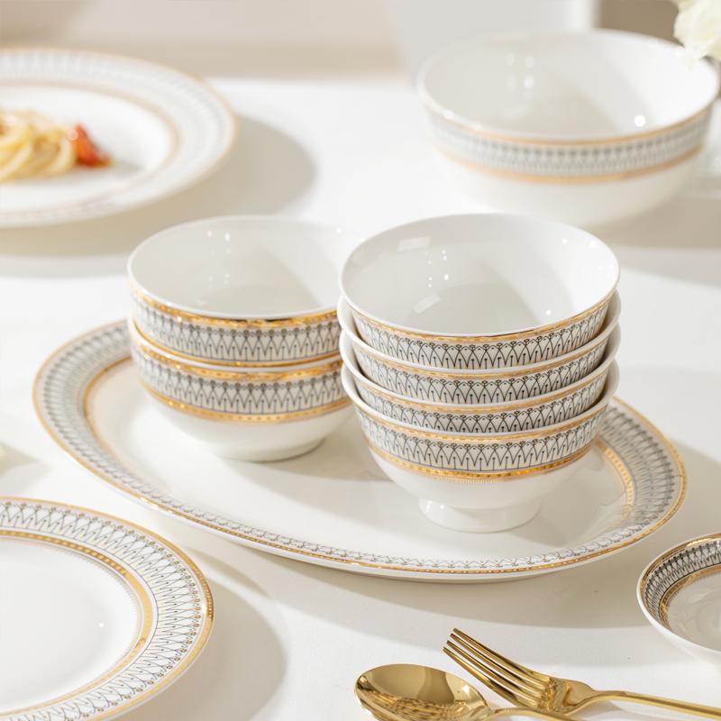 European Style Gold Rim Ceramic Dinnerware Set - Includes Large Bowls, Soup Bowls, Plates, and Rice Bowls for New Year Celebrations.