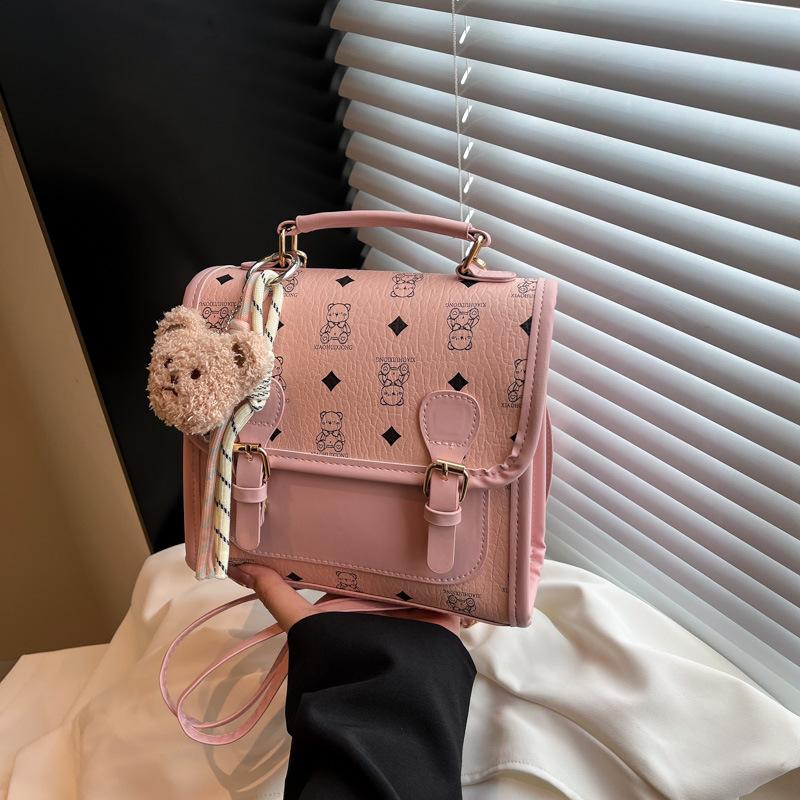 

Cute cartoon printed bear backpack women s 2025 new versatile commuter backpack fashion portable shoulder bag single bag рожевий