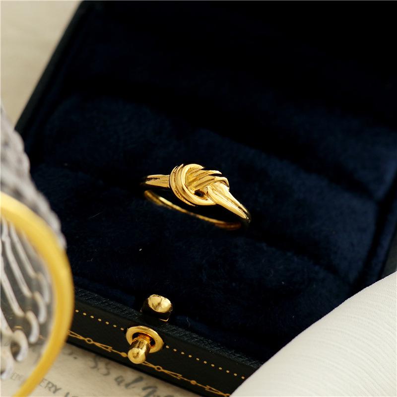 French Designer Titanium Steel Knotted Rope Ring for Women - Fashionable Simple Metal Jewelry