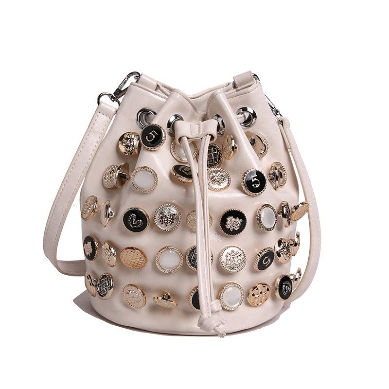 Bag summer 2025 new European and American fashion rivet shoulder bag women's versatile crossbody punk feng shui bucket bag pu