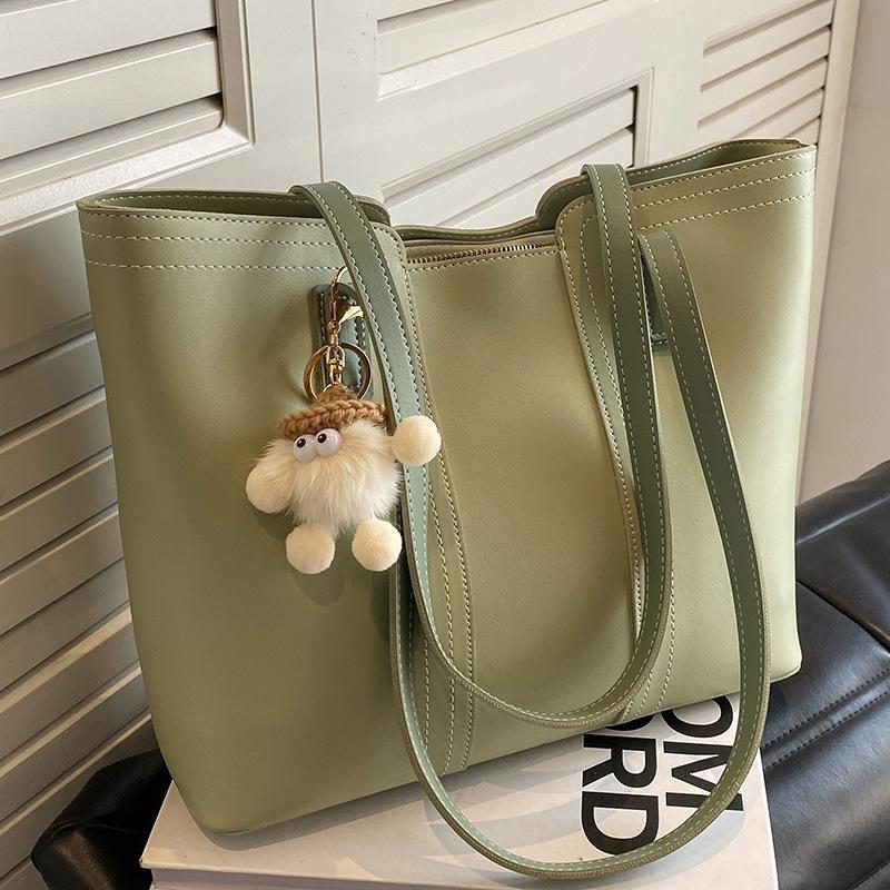 Skulderveske med stor kapasitet og ny stilig tekstur, allsidig pendler-veske for vår og sommer