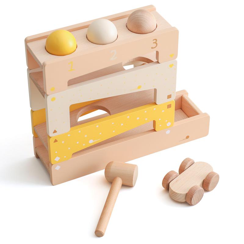 

Деревянная музыкальная игрушка-каталка для развития в раннем детстве