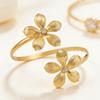 Adjustable Metallic Flower Arm Ring - Statement Jewelry for Fashion Performances