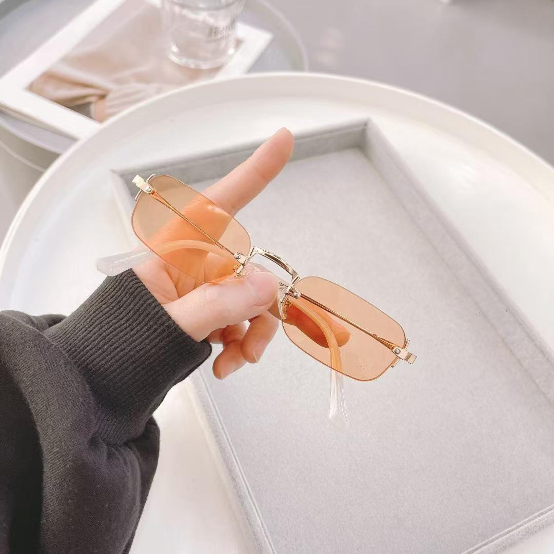 

Rectangle Shape Rimless Woman Sunglasses European American Trendy Outdoor Sun Glasses Driving Hiking Men Sun Glass