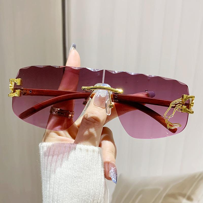 Frameless One-piece Lens Wavy Edge Ladies Personality Irregular Sunglasses