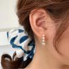 Korean Dongdaemun Pearl Heart Earrings: Unique Design, Light Luxury, Versatile Women's Accessory for Midsummer Temperament.