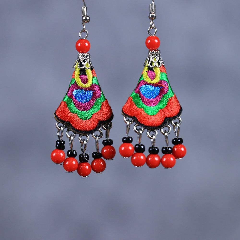 Chinese Retro Plum Blossom Fan Earrings: Women's Qipao Bell Tassel Pendants for Hanfu