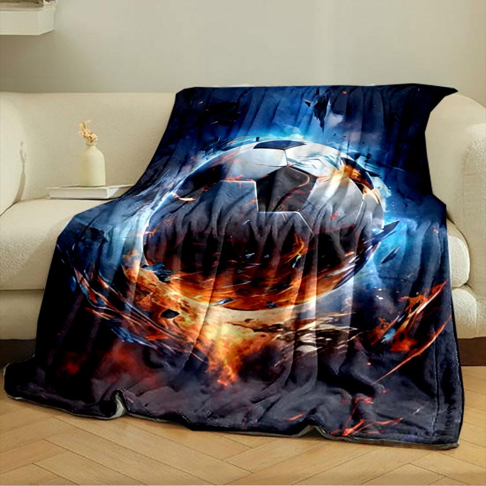 A Fiery Soccer Ball Surrounded by Intense Glowing Flames and Debris. for All Seasons Blanket Lunch Break Throw Gift