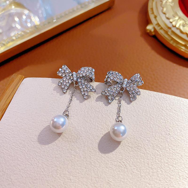 S925 Silver Needle Sweet Versatile Unique Imitation Pearl Bow Stud Earrings Trendy Niche Design Sense Premium Earrings